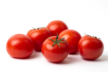 Fresh tomatoes on white background