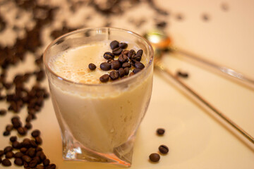 on a light background dessert coffee mousse and coffee grains
