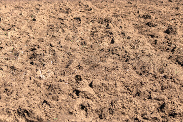 Turned and fallow arable field.
Arable land background