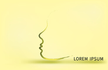 line of a female face on a white background. gold line. vector. silhouette of a woman's face