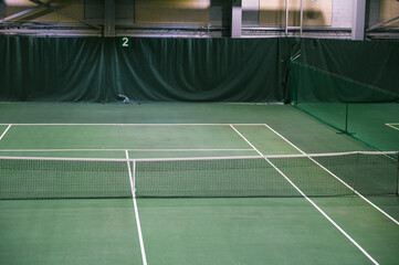 Empty green tennis court. Nobody. Top view.
