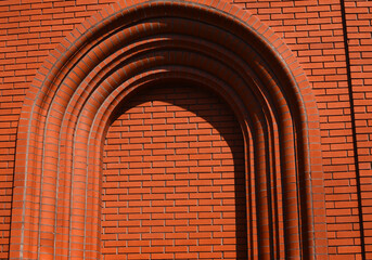 Arch red brick wall. arch texture background. High quality photo