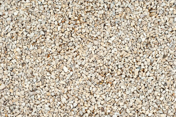 Drainage systems from small pebbles. Garden drainage for plants and trees. Yellow stones for roads and flower beds.
