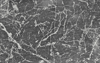 Texture of black and white marble. Stone tile with natural pattern. Marble pavement closeup.