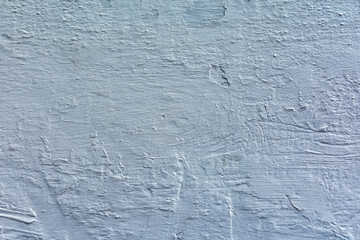 Cement plaster was applied to the wall and painted in a gray blue color