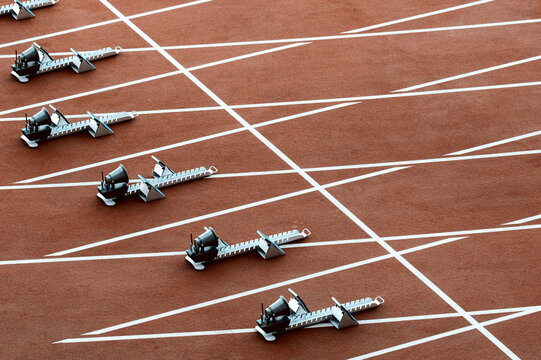 On starting block ready for sprint start. Vintage color filter