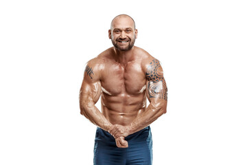 Fototapeta na wymiar Tattooed male bodybuilder posing over white background. Fitness workout concept, muscle groups, watch your body.