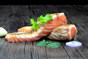 Grilled salmon Black pepper and Sprinkle coriander  on the table