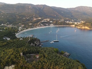 Fototapeta premium Parga Greece preveza valtos beach aerial view of the tropical and exotic historical parga town castle and island of panagia in epirus famous tourist attraction destination