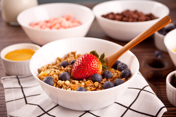 Healthy breakfast. Granola, muesli with fresh berries.