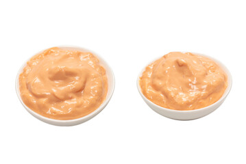 Sauce in a bowl isolated on white.