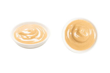 Mushroom sauce in a bowl isolated on white background.