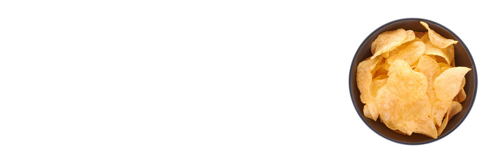 Golden potato chip in dark bowl, isolated on white background.