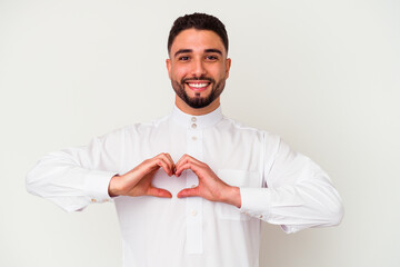 Young arab man wearing typical arab clothes isolated on white background