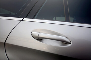 Handle of a silver car door