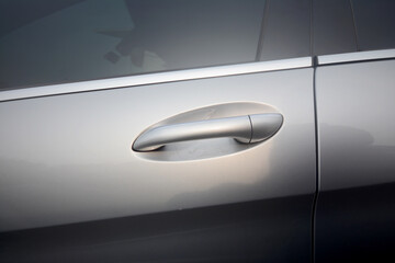 Handle of a silver car door