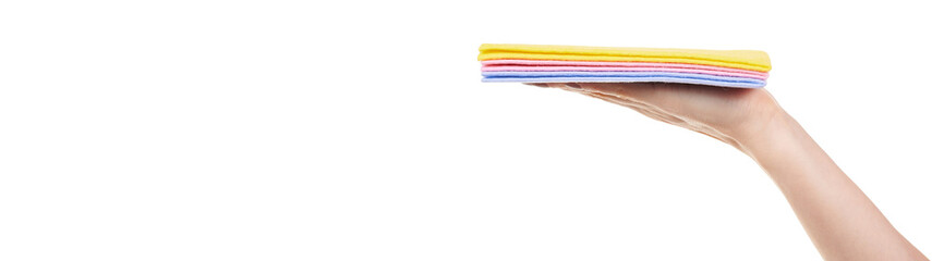 Hand with colored cleaning rag isolated on white background.