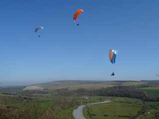 paragliding over river