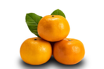 Closeup view of ripe Mandarin oranges with leaves on white background with clipping path. Mandarin orange is sweet, full of fiber and vitamin c.