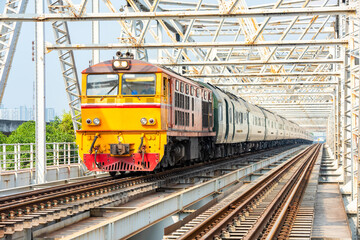Fototapeta na wymiar Special passenger train Running on the Rama 6 Bridge.