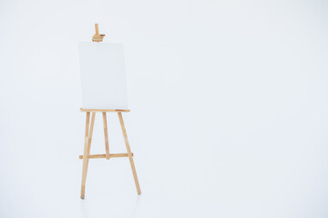 advertising stand or flip chart or blank artist easel isolated on white.