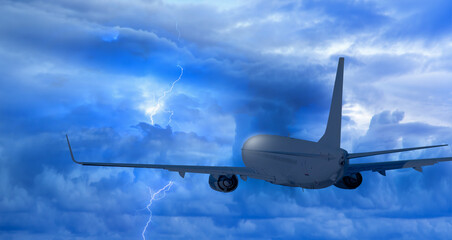 Airplane in the sky with thunder and lightning