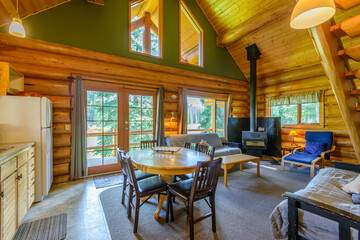 Modern dining room in log cabin or luxury house.
