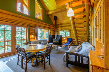 Modern dining room in log cabin or luxury house.