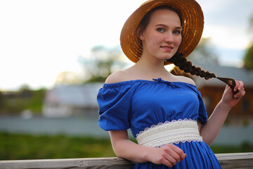 Girl in the countryside in the evening