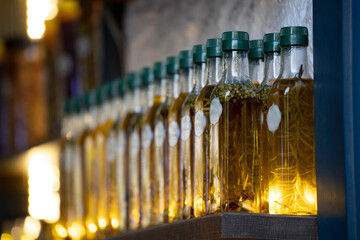Olive oils in a natural glass bottle. It was taken sideways.