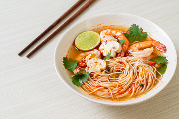 noodles with spicy soup and shrimps (Tom Yum Kung)