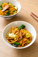 yakisoba noodles stir-fried with vegetable in asian style - vegan and vegetarian food