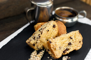 Delicious breakfast,  meal, homemade panettone and black coffee	