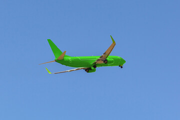 Passenger airplane flying against clear blue sky