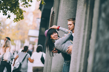 A young couple is having a date in the city.