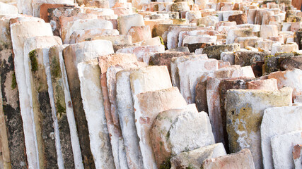 pile of old roof covering tiles