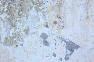 The texture of the old wall. Abstract background. White old paint