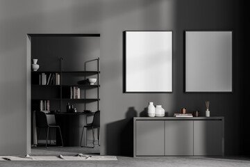 Grey living room with drawer and furniture, posters on the wall