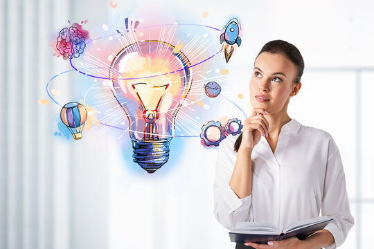 Attractive businesswoman in formal wear checking her notes in no