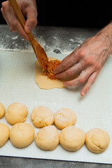 baker kneading dough