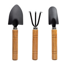 Gardening tools isolated on white background. Small shovel, spatula and rake for planting