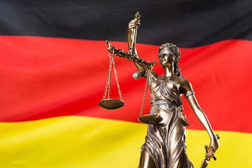 Lady justice against German flag
