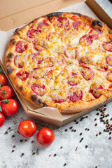 pizza sausage tomato sauce cheese trend fast food meal copy space rustic food background 