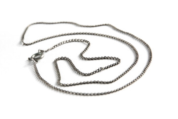 Silver chain necklace isolated on white background