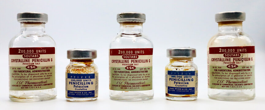 New York, USA – April 18, 2021: Vintage 1950s Vials of PENICILLIN G Produced by CSC Pharmaceuticals and Chas PFIZER & Co. New York