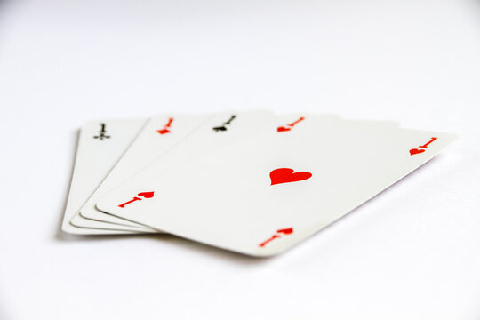 Four aces playing card game on white background