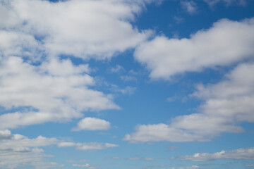 Blue sky background with clouds.Spring landscape.