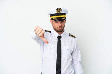 Airplane Brazilian pilot isolated on white background showing thumb down with negative expression
