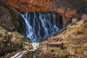 Unique Kapuzbasi Waterfalls  with mill in Aladaglar National Park, Tuaruz Mountains of Turkey