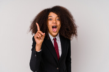 Young African American business woman wearing a suit isolated on white background having an idea, inspiration concept.